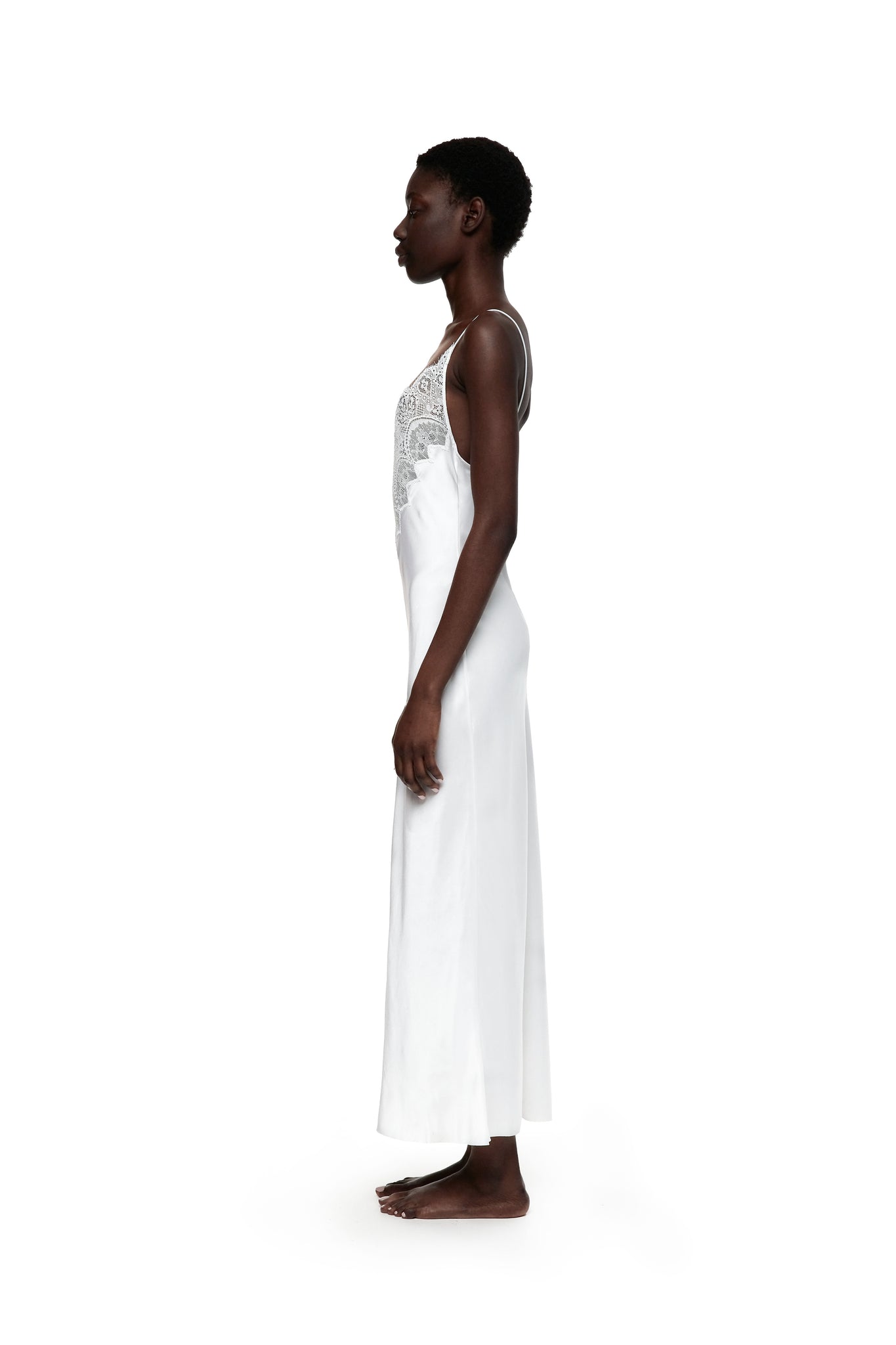 Сукня шовкова з мереживом в бiлому кольорi